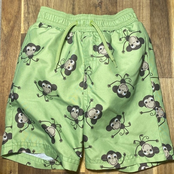 Gymboree green swim trunks w/monkeys. 12 months - Picture 1 of 7